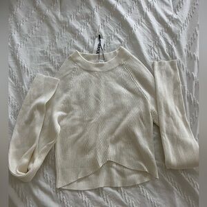 Tight white comfy shirt.